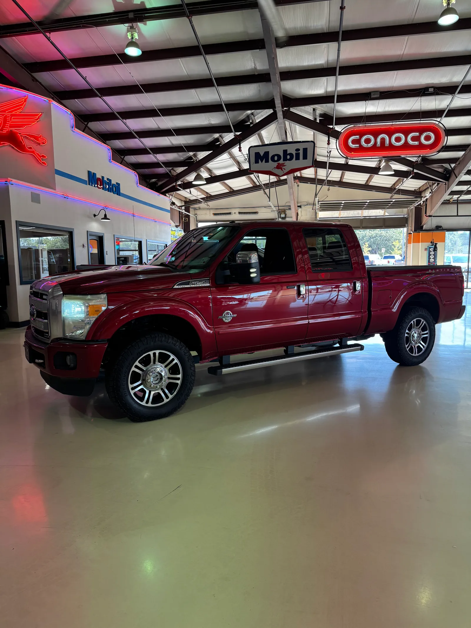 Red Ford F-250 Platinum diesel crew cab bought by Texas Motorcars